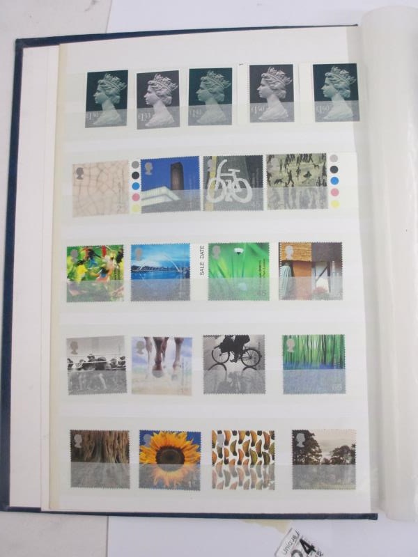 A good album of mint definitive stamps and sets (some in strips, many with gutter sides), - Image 2 of 13