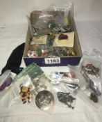 A large mixed lot of badges