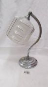An art deco chrome plated table lamp complete with shade (needs wiring).