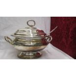 A superb quality silver plate soup tureen with ladle.