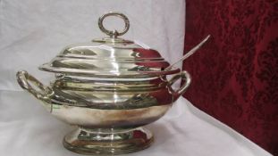 A superb quality silver plate soup tureen with ladle.