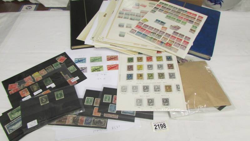 A very good collection of USA and Canada stamps including early and mint examples.