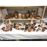 A large quantity of carved/turned wooden items including mushrooms, Teddy Bears & fruit etc.