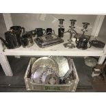 A large selection of silver plate including tureen, candelabra, part tea set & trays etc.