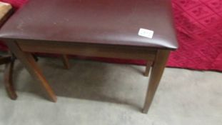 An organ stool containing sheet music. (Collect only).