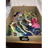 A large box of costume jewellery