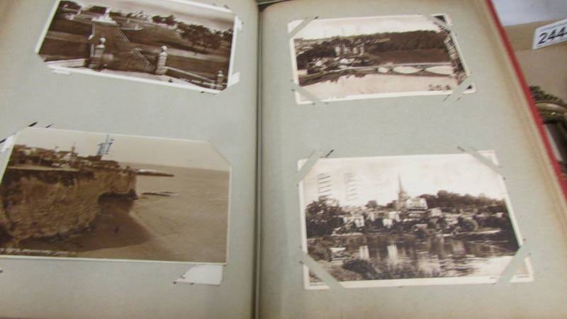 Three albums of postcards including an unusual double sided album, a scrap album, - Image 16 of 22