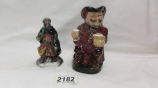 A Royal Doulton figurine 'Good King Wenceslas' HN3262 and a Royal Doulton Toby jug 'Falstaff' 8328D.