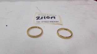Two 22 carat gold rings, total weight 4.7 grams.