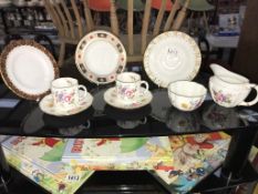 A quantity of various pieces of Royal Crown Derby china, 3 small plates, cups/saucers,