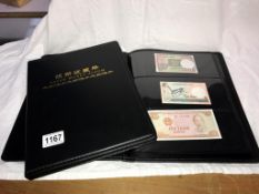 2 albums of paper money