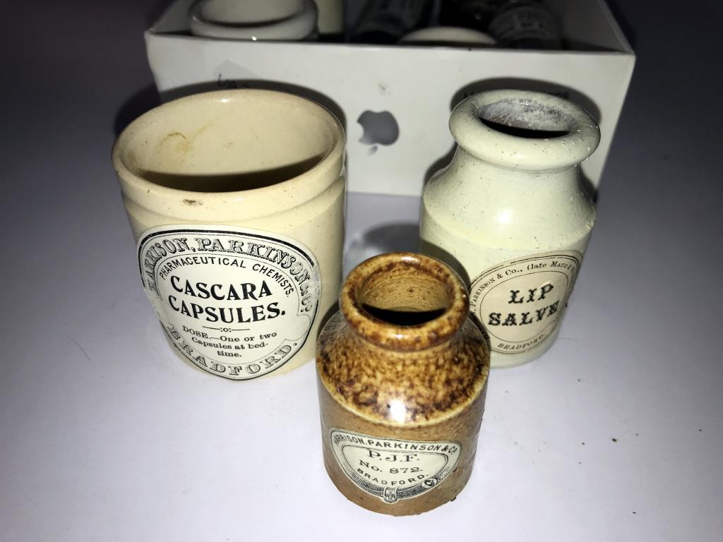 A selection of small stoneware jars & bottles with various advertising labels - Image 3 of 5