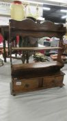 A small mahogany shelf unit with two drawers. (Collect only).