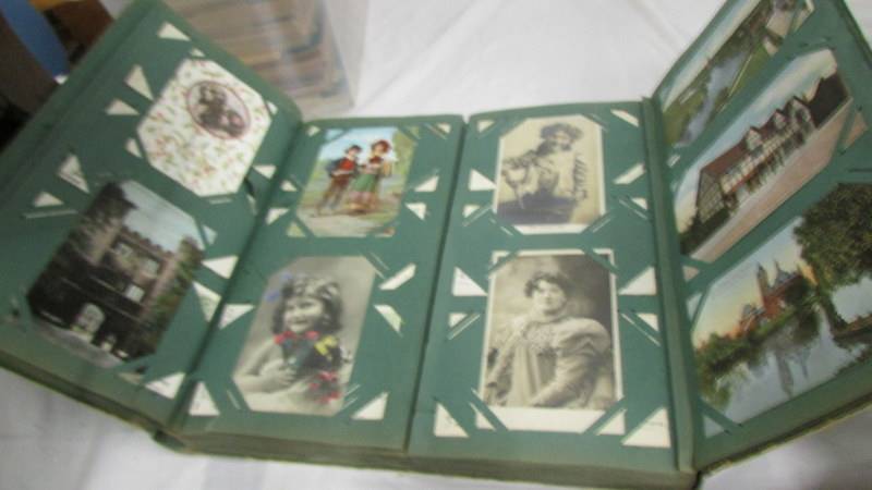 Three albums of postcards including an unusual double sided album, a scrap album, - Image 19 of 22