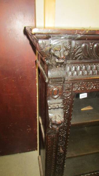 A carved oak pier cabinet, (needs some repair). (Collect only). - Image 2 of 3