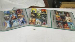 Three folders of fantasy collector's cards including Vallesoi, Hildebrandt etc.
