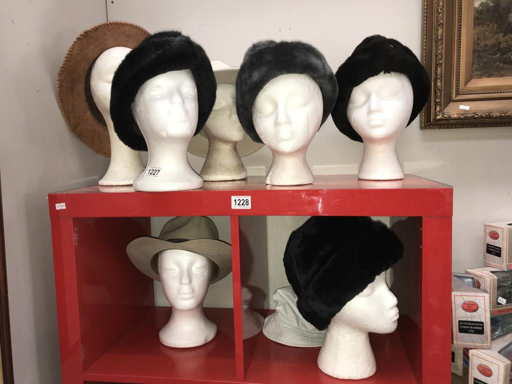 A good selection of Russian type hats and other hats (heads not included)