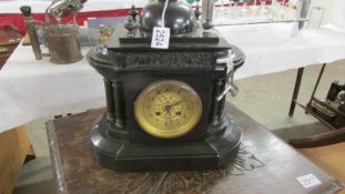 A black slate mantel clock. (Collect only).