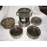 4 Victorian silver plated bottle coasters & a bottle holder