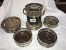 4 Victorian silver plated bottle coasters & a bottle holder