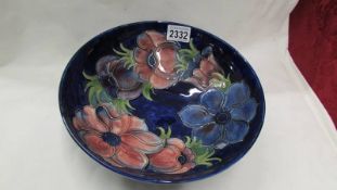 A Moorcroft blue anemone bowl, 10"diameter.