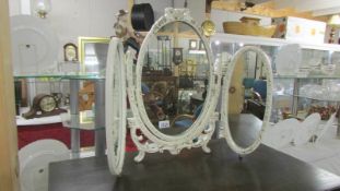 A triple dressing table mirror. (Collect only).