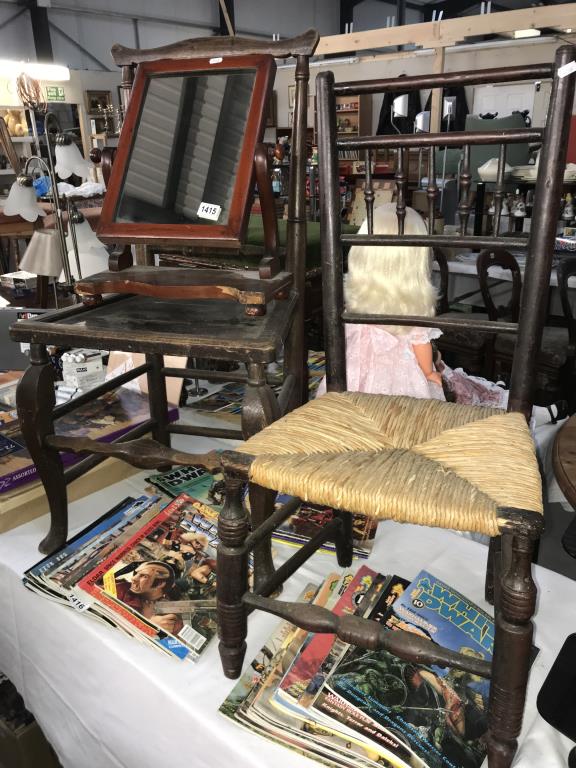 A small farm chair plus one other and a vintage mirror