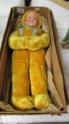 A Merrythought Hygenic Toys doll in original box.