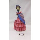 A Royal Doulton figurine, 'Victorian Lady' HN728. (hairline crack to base).