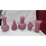 Five pieces of Mdina pink glass being four vases and a scent bottle.