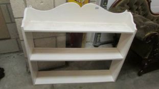 A set of painted wall shelves. (Collect only).