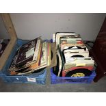 A large lot of 7" records (150+) and approximately 40 x 10" records