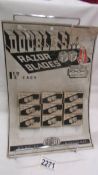 A rare Double Six Razor Blades advertising display sign including nine boxes of razor blades.