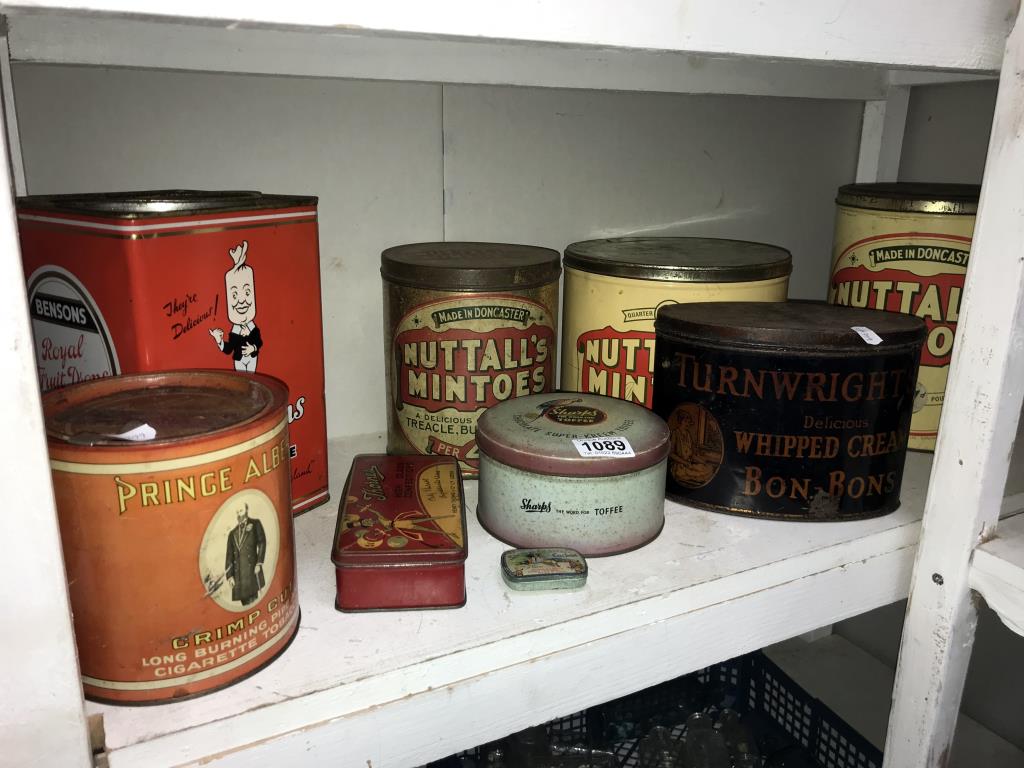 A quantity of large advertising tins including Nuttall's, Turnwrights, Benson's & Prince Albert etc.