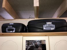 2 Atomic hard cased suitcases with combination locks