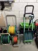 2 hose pipes on reels, an extension lead, 2 garden seed drills,