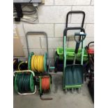 2 hose pipes on reels, an extension lead, 2 garden seed drills,