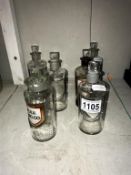 A quantity of Victorian chemist bottles with stoppers,