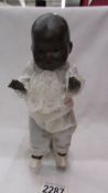 A Victorian black baby doll, A M Germany, 351/210K.