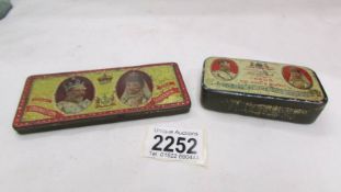 Two 1902 Coronation tins, Sheffield and Leeds, one still containing original chocolate.