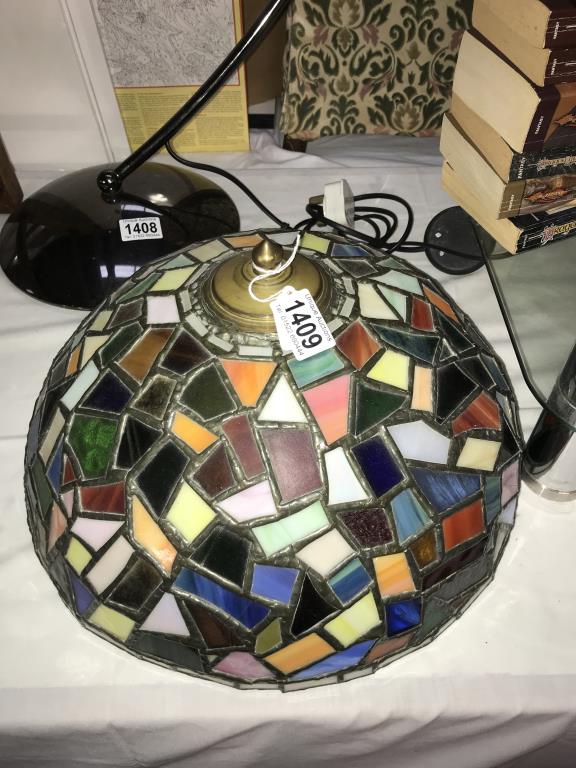 A large Tiffany style leaded glass lampshade