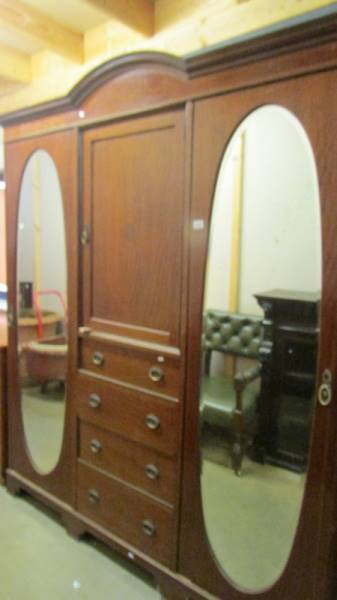 A mahogany mirror door combination wardrobe. (Collect only).