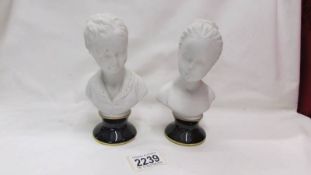 A pair of continental porcelain busts.