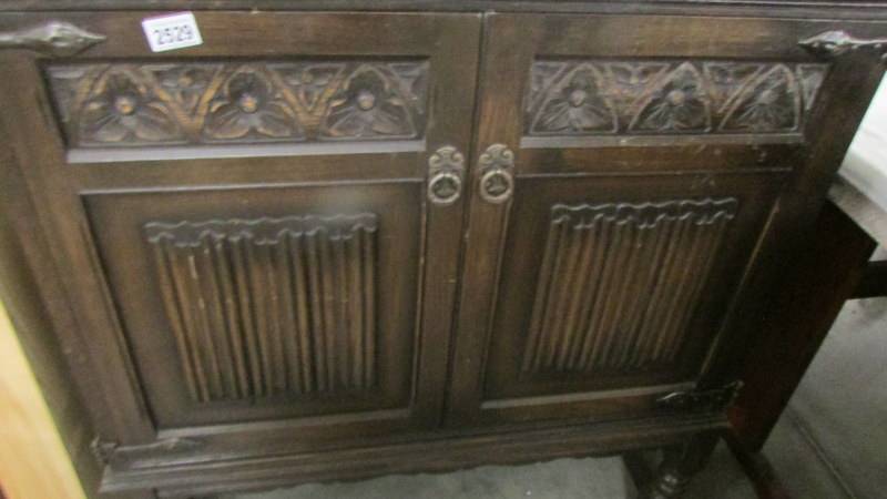 An oak two door cupboard. (Collect only). - Image 2 of 2