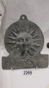 An old fire plate/mark featuring sun, 425573.