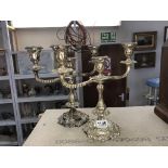 A pair of silver plated candelabra