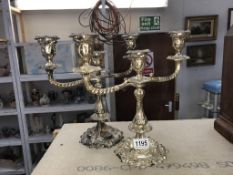 A pair of silver plated candelabra