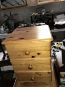 A pine 3 drawer bedside chest of drawers