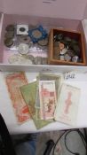 A box of assorted coins including Victorian, crowns etc., and some bank notes.