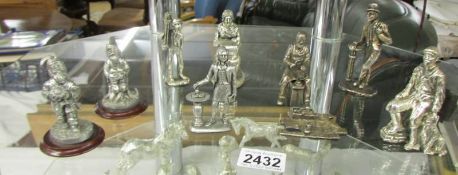Eight miniature metal figures including cobbler, gnomes etc.